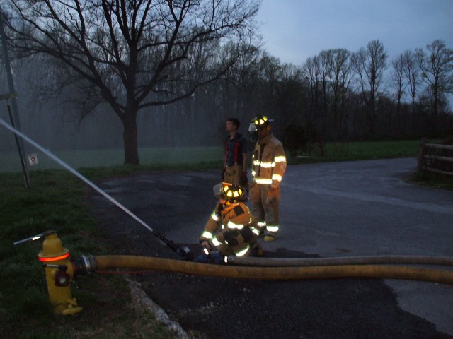 Firefighters training on the BlitzFire step gun.